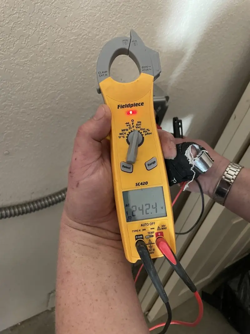 Voltage testing with clamp meter during Electrical Installation Services in Winter Garden